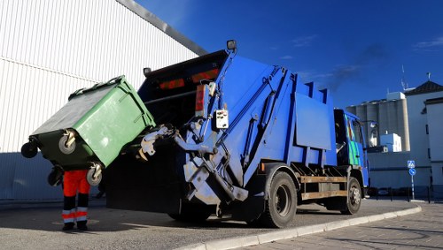 Professional site clearance machinery operating in Tottenham