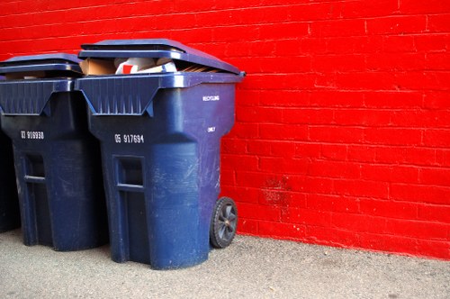 Residential project site with a skip for waste disposal