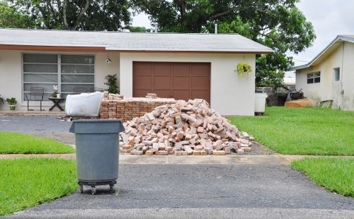 Workers managing construction waste