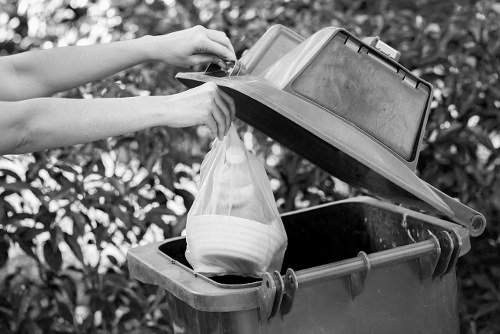 Professional rubbish collectors at work
