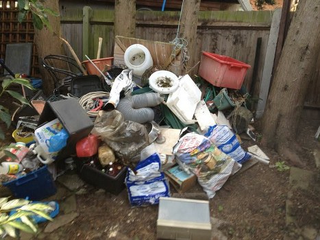 Council officials inspecting a skip placement